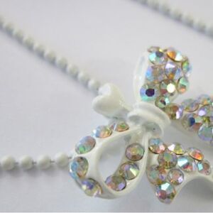 White Enameled Necklace with Bow Pendant & Iridescent AB Crystals.